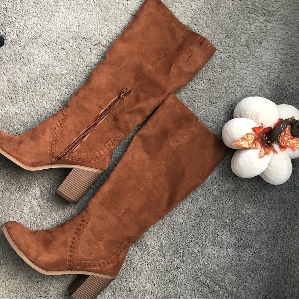 Brown leg high boots